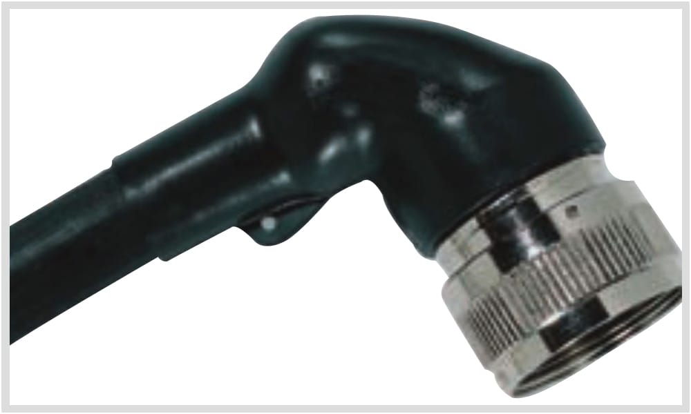 A recovered right angle boot on a circular connector with a knurled metal coupling ring, the black moulding turning the cable through 90 degrees away from the shell.
